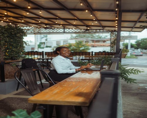 Working on laptop in an outdoor cafe